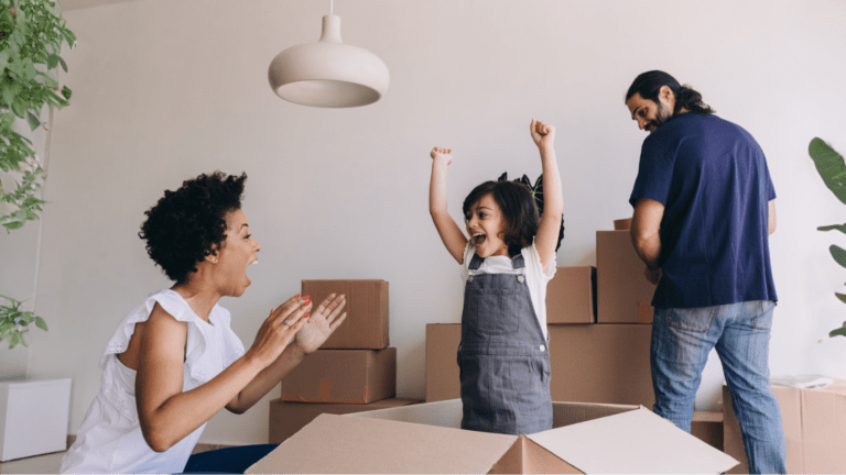 Family packing eco-friendly moving boxes for the holidays - Eco Movers